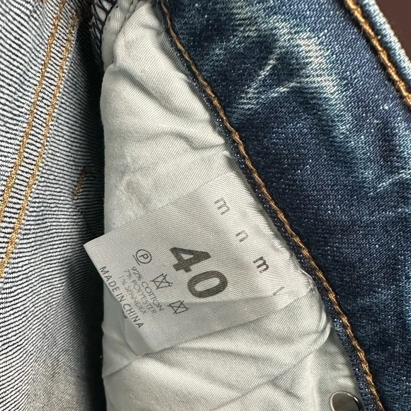 Denim jeans with pink rhinestones